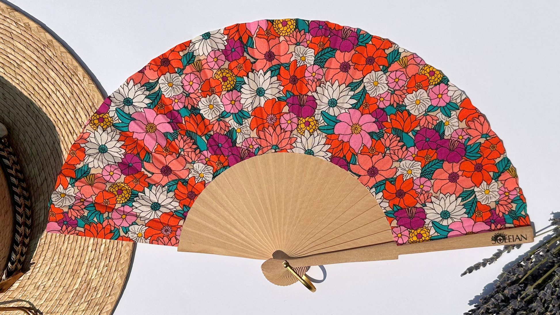 Éventail Méline à motifs floraux multicolores fabriqué en Provence